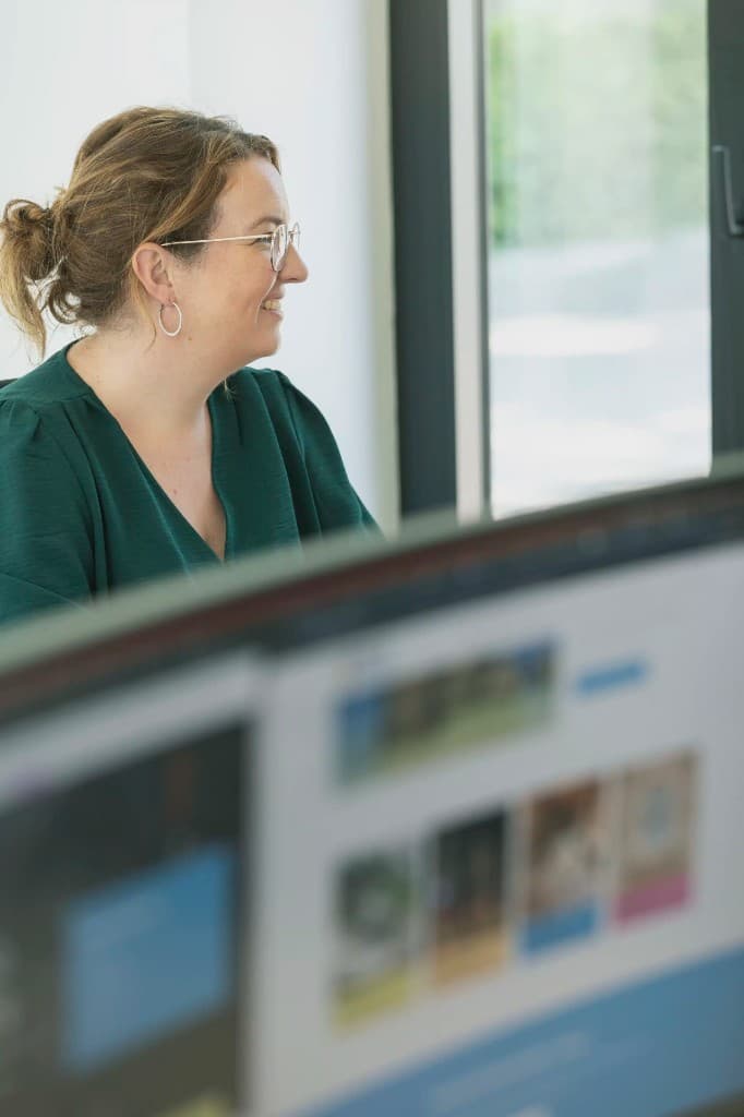 Nathalie at her desk